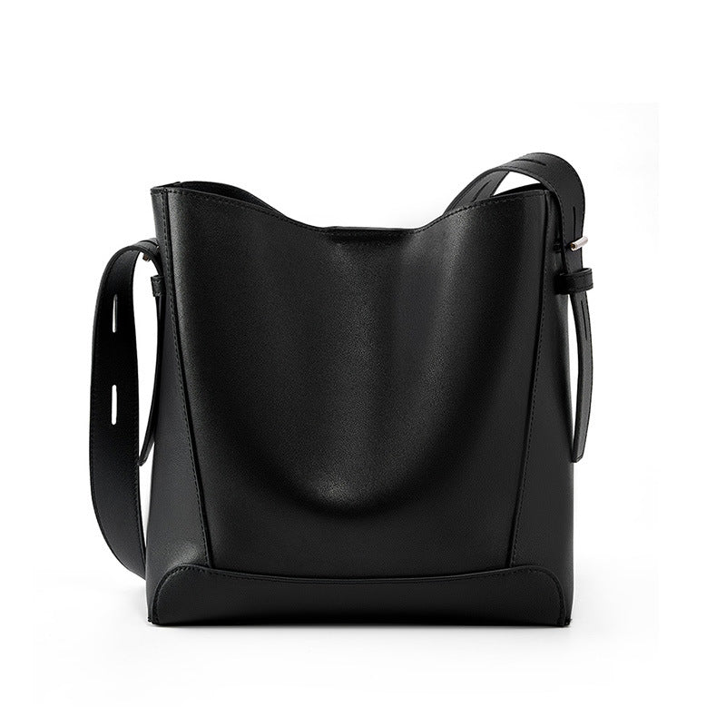 
The Lucca — Genuine leather, cut for everyday crossing.