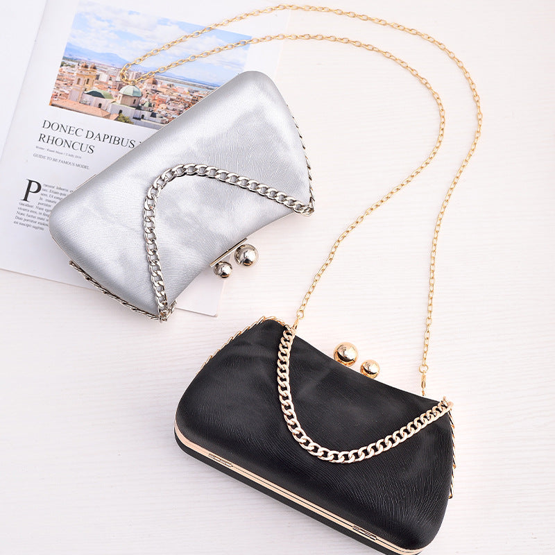 
The Vesper — Chain-strap minimalism for the evening after the day.