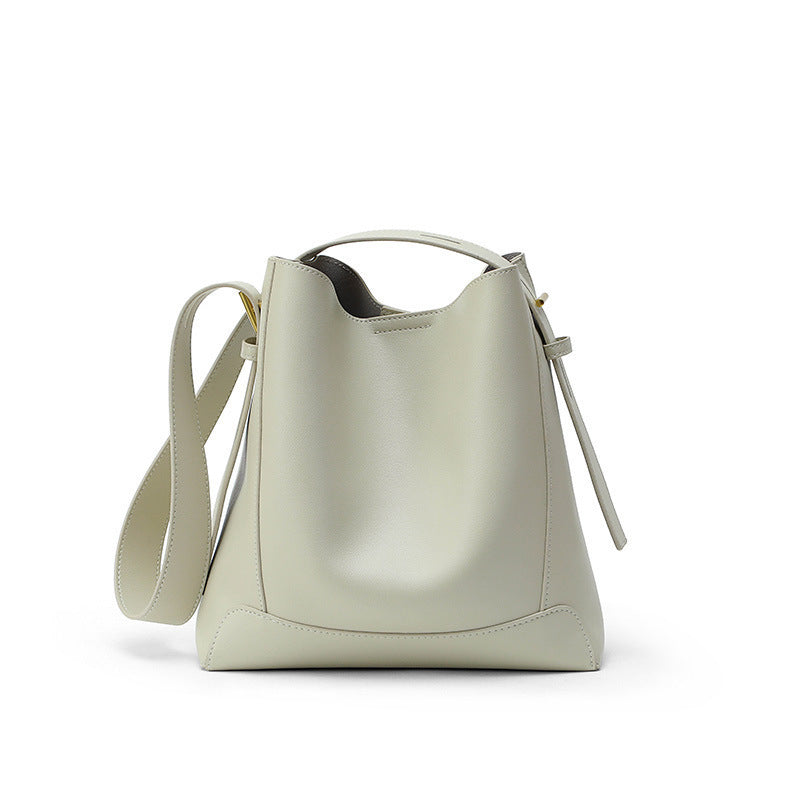 
The Lucca — Genuine leather, cut for everyday crossing.
