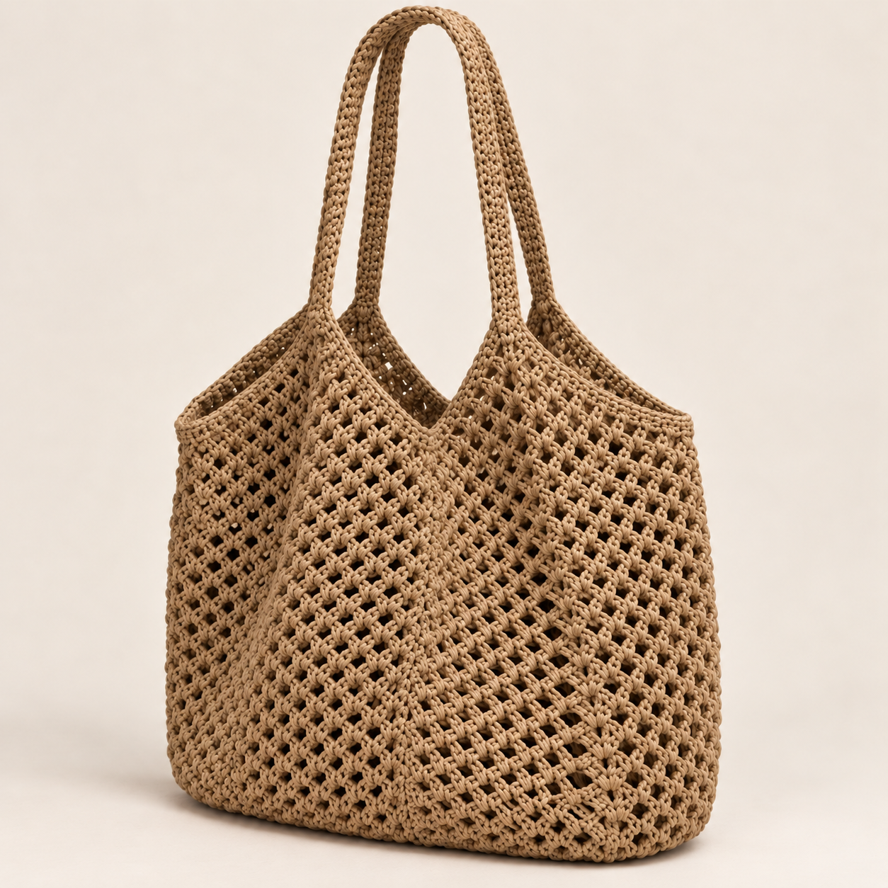 
The Ibiza woven beach tote in Khaki, studio shot.
