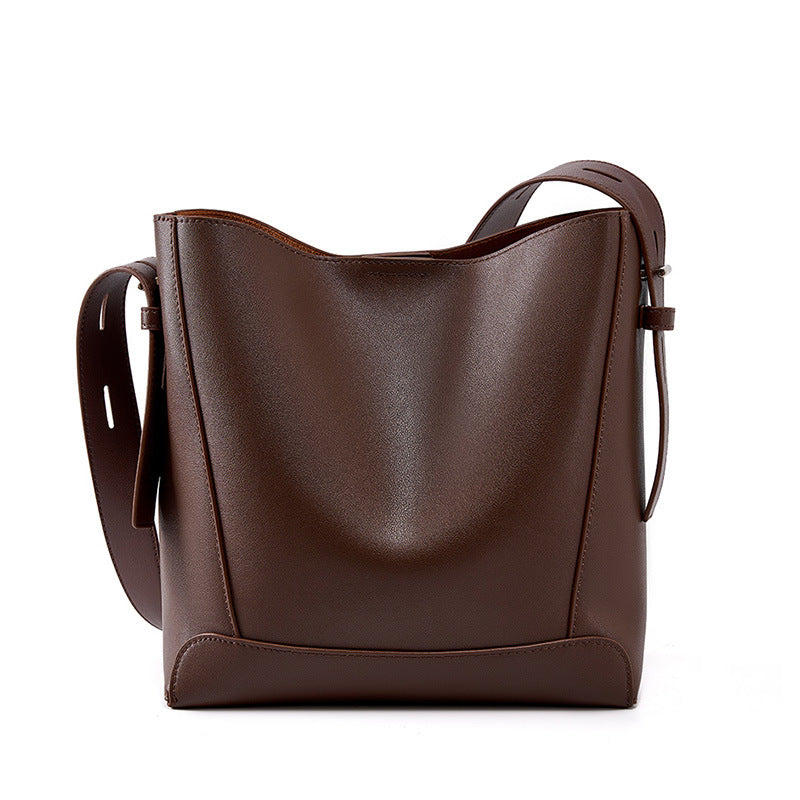 
The Lucca — Genuine leather, cut for everyday crossing.
