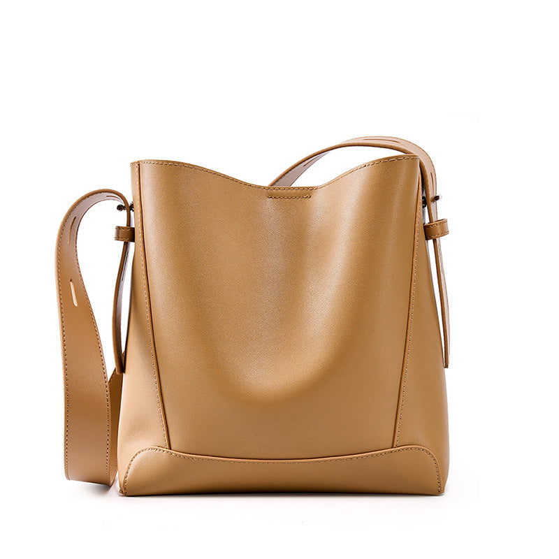 
The Lucca — Genuine leather, cut for everyday crossing.