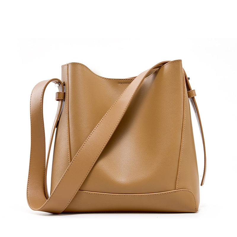
The Lucca — Genuine leather, cut for everyday crossing.