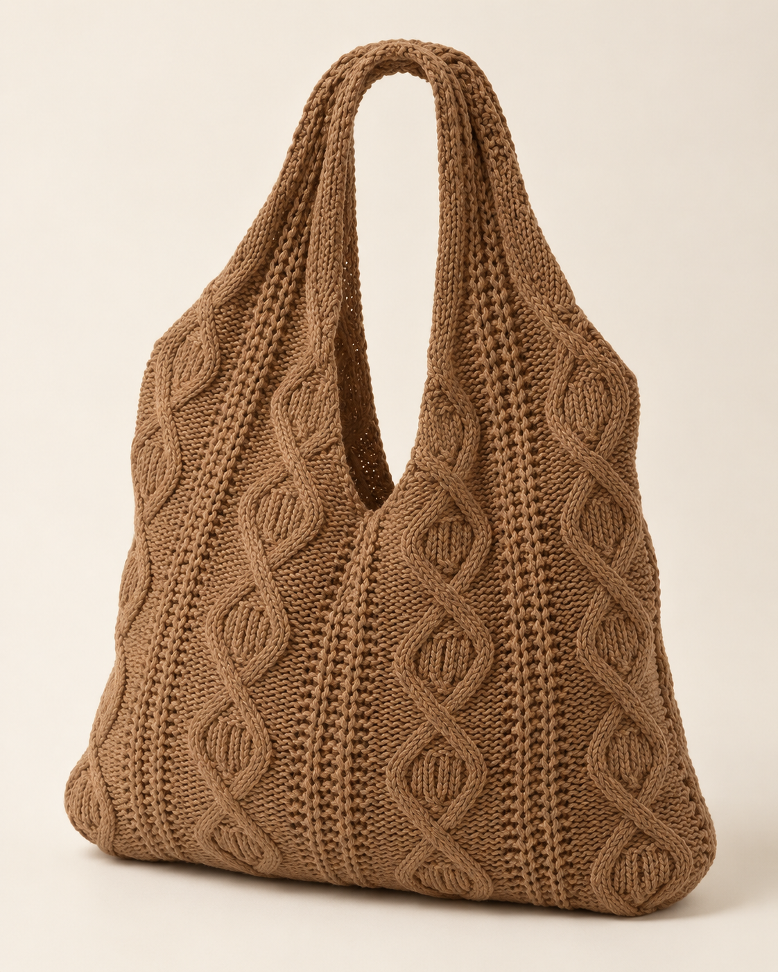 
The Mykonos crochet tote bag in Coffee Color, studio shot.