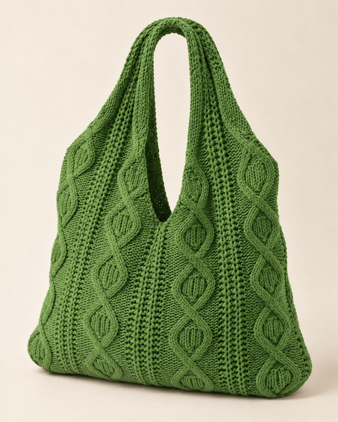 
The Mykonos crochet tote bag in Grass Green, studio shot.