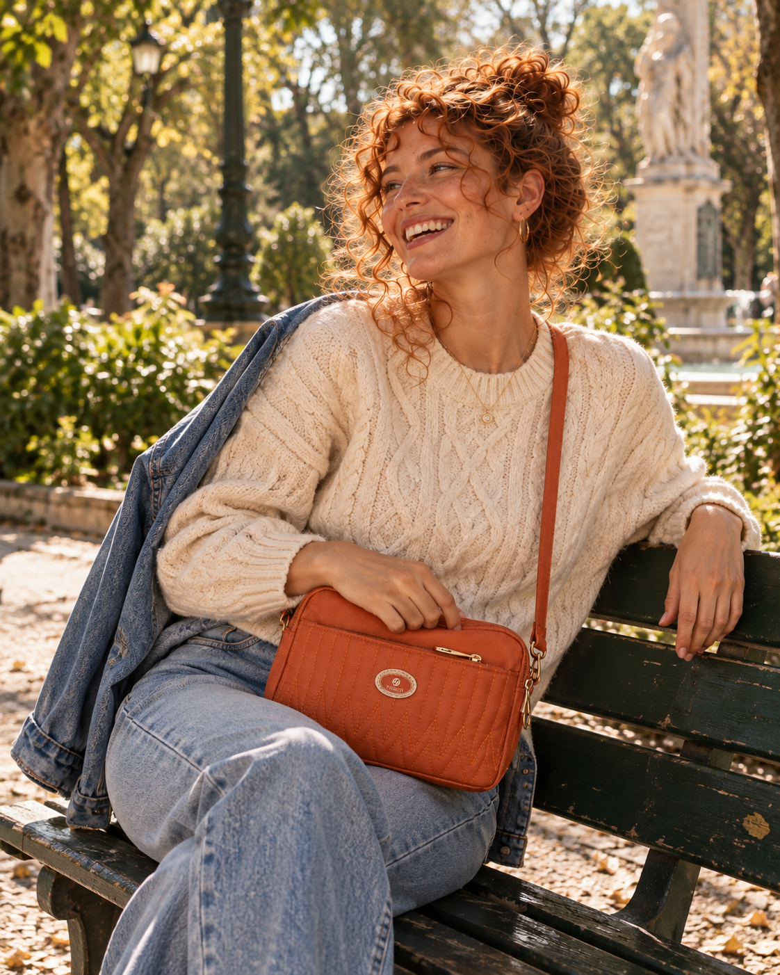 
The Menton Orange handbag with Isabel at Jardim da Estrela in Lisbon.